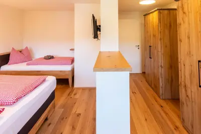 Ein Bett oder Betten in einem Zimmer der Unterkunft Gästehaus Schwaiger