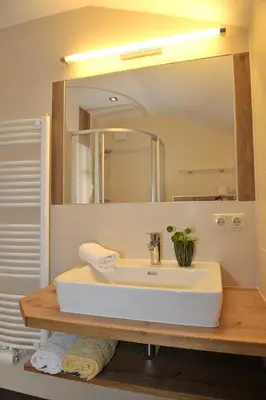 Ein Badezimmer in der Unterkunft Edelweiss Apartments