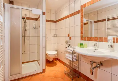 Ein Badezimmer in der Unterkunft Aparthotel Ramsau