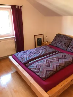 Ein Bett oder Betten in einem Zimmer der Unterkunft Villa Nussbaum