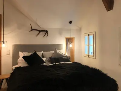 Ein Bett oder Betten in einem Zimmer der Unterkunft Seehaus am Hallstätter See