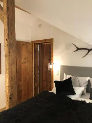 Ein Bett oder Betten in einem Zimmer der Unterkunft Seehaus am Hallstätter See