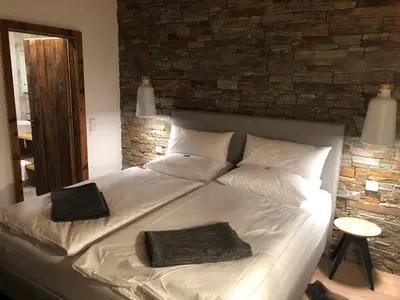 Ein Bett oder Betten in einem Zimmer der Unterkunft Seeapartment am Hallstätter See