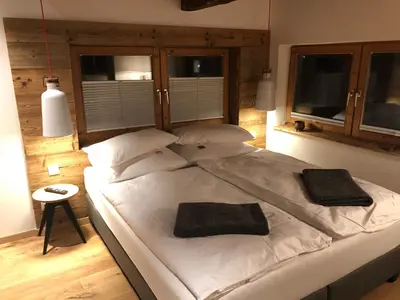 Ein Bett oder Betten in einem Zimmer der Unterkunft Bootshaus am Hallstätter See