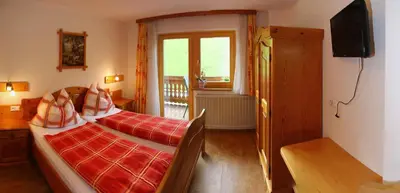 Ein Bett oder Betten in einem Zimmer der Unterkunft Haus Harmonika