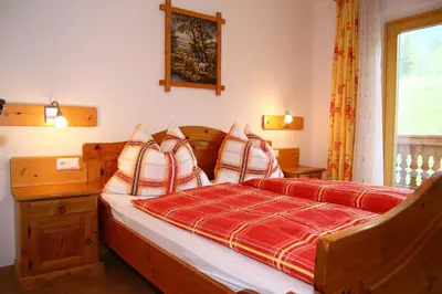 Ein Bett oder Betten in einem Zimmer der Unterkunft Haus Harmonika