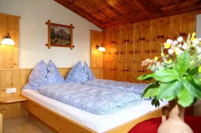 Ein Bett oder Betten in einem Zimmer der Unterkunft Haus Harmonika