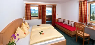 Ein Bett oder Betten in einem Zimmer der Unterkunft Berggasthof Bliembauer