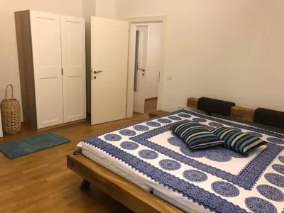 Ein Bett oder Betten in einem Zimmer der Unterkunft Ferienwohnung Eiskögerl im Barbarahof