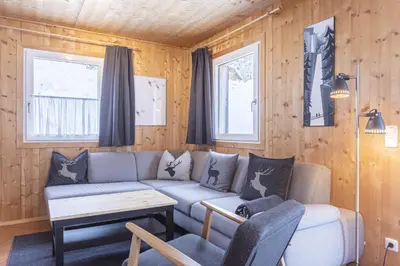 Ein Sitzbereich in der Unterkunft Alpendorf Dachstein West by ALPS RESORTS