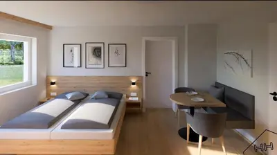 Ein Bett oder Betten in einem Zimmer der Unterkunft Pension Reiterhaus