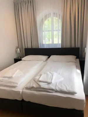 Ein Bett oder Betten in einem Zimmer der Unterkunft Townville Chalet´s