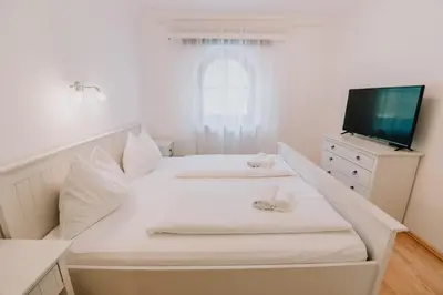Ein Bett oder Betten in einem Zimmer der Unterkunft Townville Chalet´s