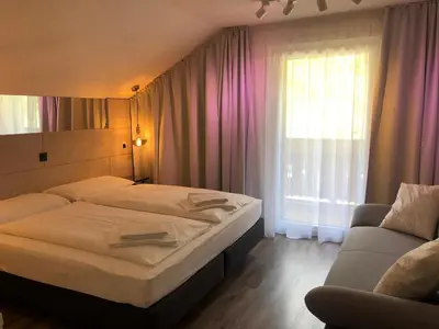 Ein Bett oder Betten in einem Zimmer der Unterkunft Townville Chalet´s