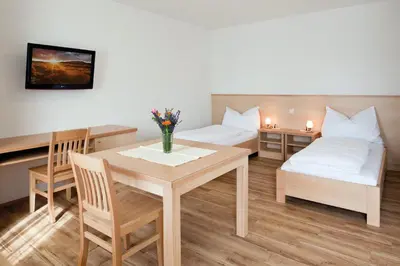 Ein Bett oder Betten in einem Zimmer der Unterkunft Vogelhubergut - Familie Scherleithner