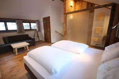 Ein Bett oder Betten in einem Zimmer der Unterkunft Appartementhaus Brunnenhof