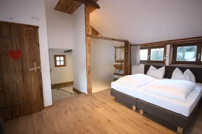 Ein Bett oder Betten in einem Zimmer der Unterkunft Appartementhaus Brunnenhof