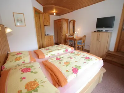 Ein Bett oder Betten in einem Zimmer der Unterkunft Sauna-Apartment in Schladming