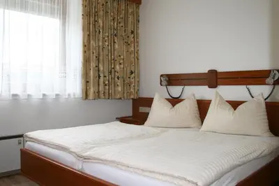 Ein Bett oder Betten in einem Zimmer der Unterkunft Appartementhaus Novak