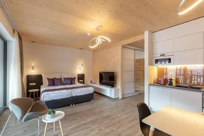 Ein Bett oder Betten in einem Zimmer der Unterkunft ARTMUR Apartment