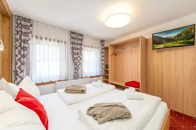 Ein Bett oder Betten in einem Zimmer der Unterkunft Chalet am See - by myNests