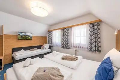 Ein Bett oder Betten in einem Zimmer der Unterkunft Chalet am See - by myNests