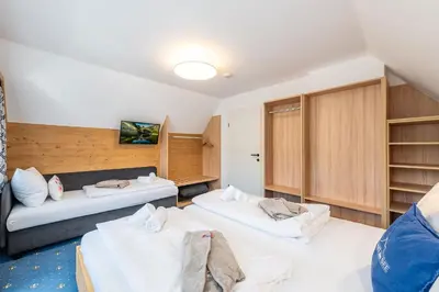 Ein Bett oder Betten in einem Zimmer der Unterkunft Chalet am See - by myNests