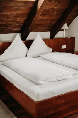 Ein Bett oder Betten in einem Zimmer der Unterkunft EnjoyTheAlps - Appartements BARBARA