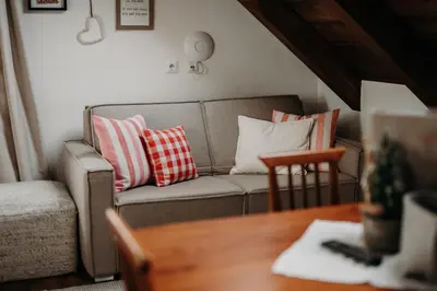 Ein Sitzbereich in der Unterkunft EnjoyTheAlps - Appartements BARBARA