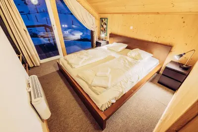 Ein Bett oder Betten in einem Zimmer der Unterkunft Woody Park