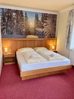 Ein Bett oder Betten in einem Zimmer der Unterkunft Pension Lambrecht