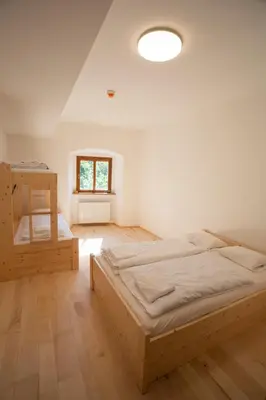 Ein Bett oder Betten in einem Zimmer der Unterkunft Burg Altpernstein