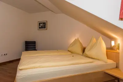 Ein Bett oder Betten in einem Zimmer der Unterkunft Ferienhaus Elisabeth