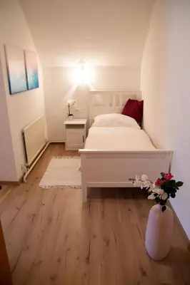 Ein Bett oder Betten in einem Zimmer der Unterkunft Apartments Marie B