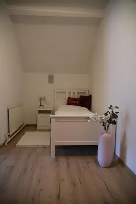Ein Bett oder Betten in einem Zimmer der Unterkunft Apartments Marie B
