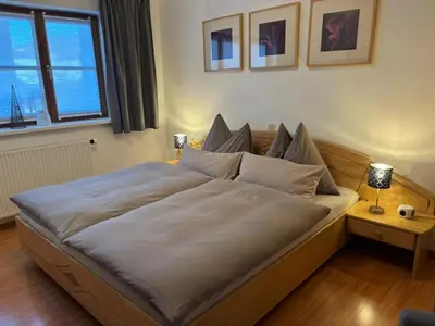 Ein Bett oder Betten in einem Zimmer der Unterkunft Ferienwohnung Wohlesser