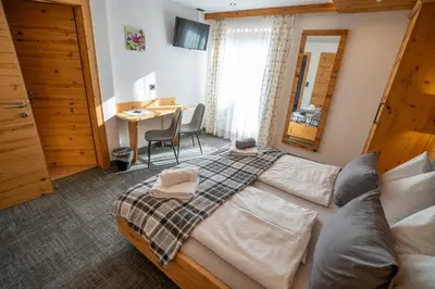 Ein Bett oder Betten in einem Zimmer der Unterkunft Haus Höllwart