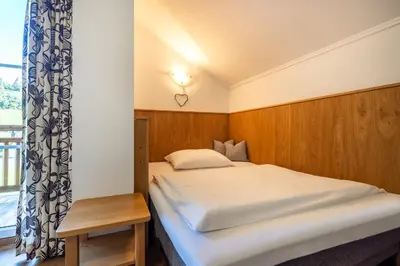 Ein Bett oder Betten in einem Zimmer der Unterkunft Appartements Sonnrain