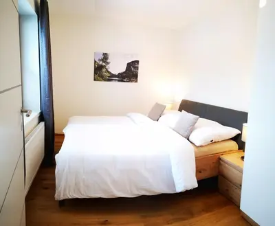 Ein Bett oder Betten in einem Zimmer der Unterkunft Ferienwohnungen BERGfeeling