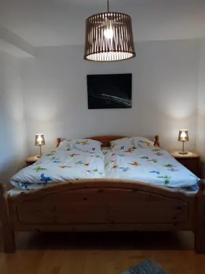 Ein Bett oder Betten in einem Zimmer der Unterkunft Haus Höber