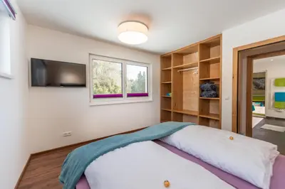 Ein Bett oder Betten in einem Zimmer der Unterkunft Appartement Ahorn