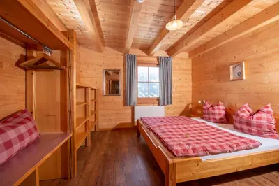 Ein Bett oder Betten in einem Zimmer der Unterkunft Berghüttn Pruggern
