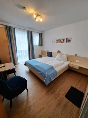Ein Bett oder Betten in einem Zimmer der Unterkunft Sonnenhügel