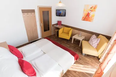Ein Bett oder Betten in einem Zimmer der Unterkunft Sonnenhügel