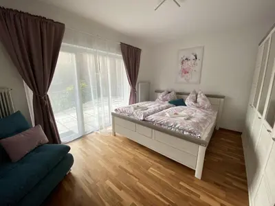 Ein Bett oder Betten in einem Zimmer der Unterkunft Apartment A&A