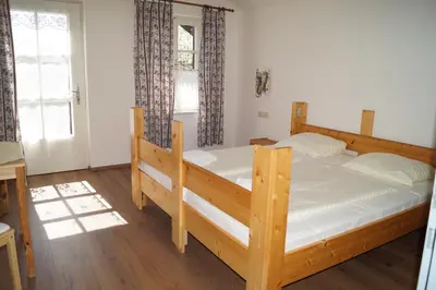 Ein Bett oder Betten in einem Zimmer der Unterkunft Hotel YOUHEY am Wolfgangsee