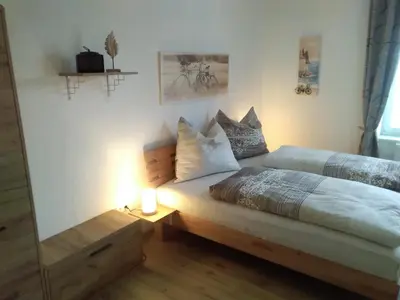 Ein Bett oder Betten in einem Zimmer der Unterkunft Bike Pension Knausz