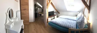 Ein Bett oder Betten in einem Zimmer der Unterkunft Bike Pension Knausz