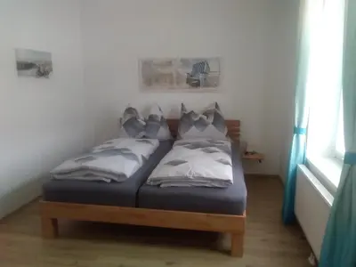 Ein Bett oder Betten in einem Zimmer der Unterkunft Bike Pension Knausz