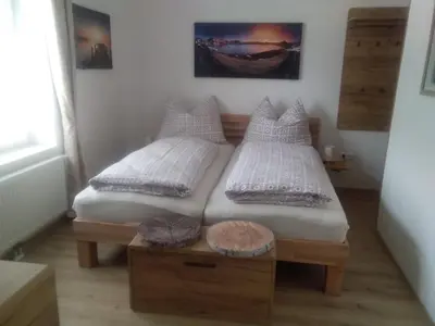 Ein Bett oder Betten in einem Zimmer der Unterkunft Bike Pension Knausz
